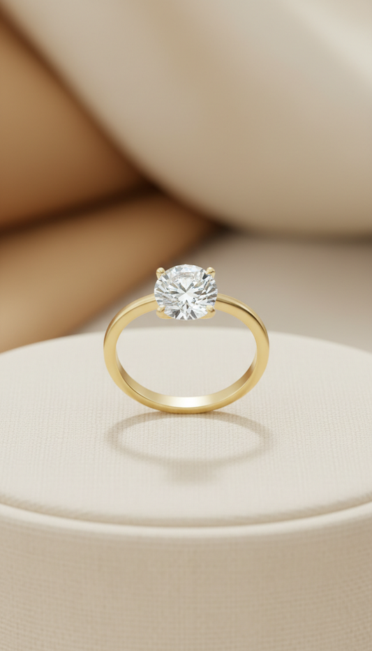 Solitaire diamond engagement ring in yellow gold